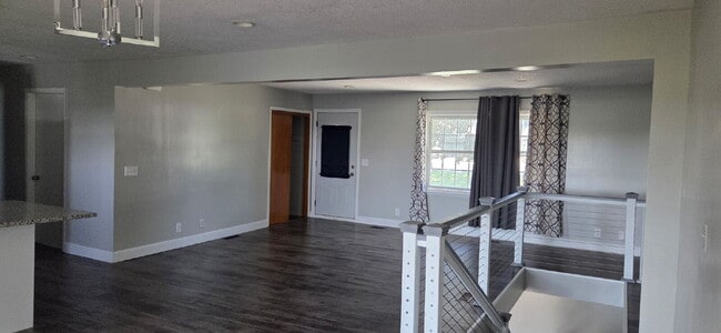 Building Photo - Charming 4-Bedroom Haven with Hardwood Elegance on Main St, New Prague!