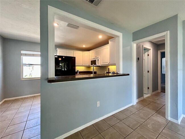 Building Photo - 6821 Onyx Dr N