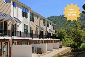 Building Photo - End-Unit Apartment With $1,000 Move-in Spe...