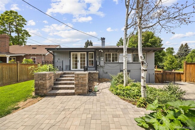 Building Photo - "Spacious 5-Bedroom Gem with Hardwood Floors & Cozy Fireplace in Denver's Heart!"