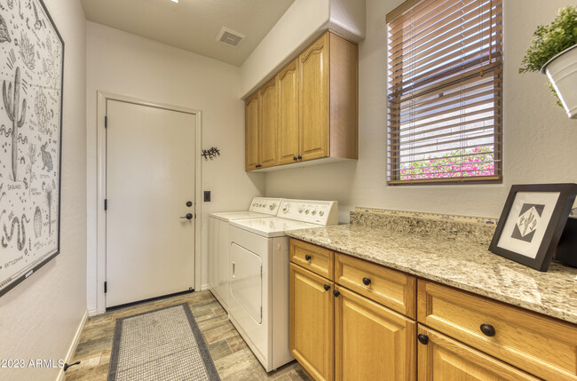 Building Photo - 6879 E Amber Sun Dr