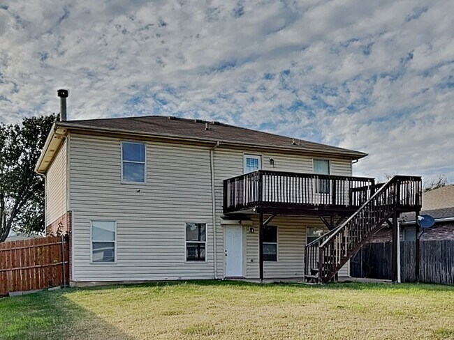 Building Photo - Corner Lot Charmer with Two-Story Deck and Bonus Game Room!