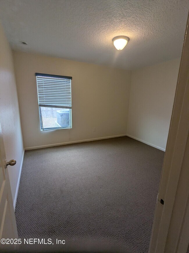 Building Photo - 15379 Bareback Dr