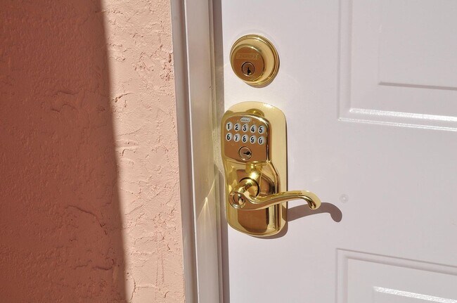 Electronic lock on the front door. Never get locked out! New combination coded for you! - 5009 46th St W