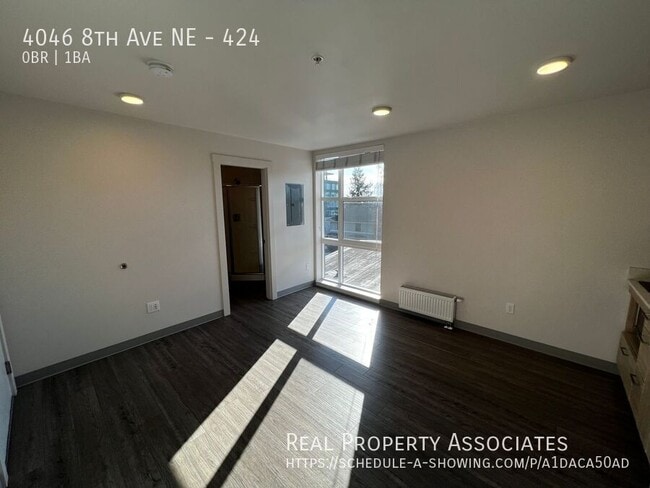 Building Photo - 4046 8th Ave NE