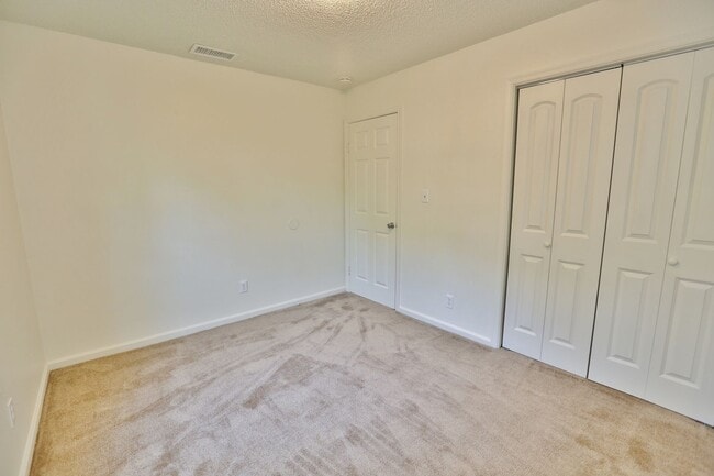 Building Photo - COMPLETELY UPDATED & READY 05-08-26!! 2-Bedroom 2nd Floor Duplex Just Minutes to the Beach!