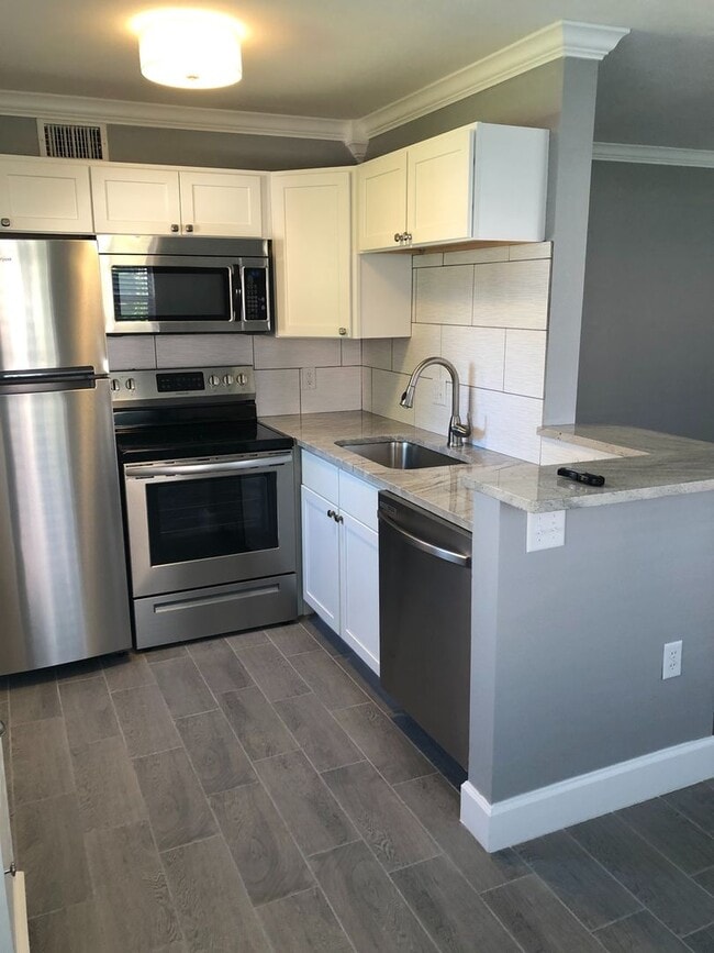 Building Photo - WALK TO THE BEACH FROM YOUR TOTALLY UPDATE...