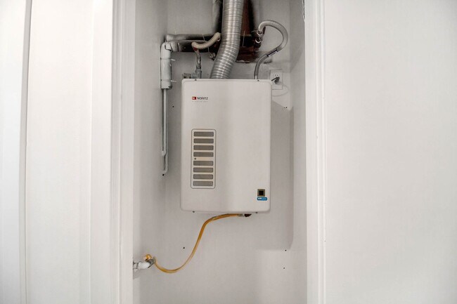 TANK LESS WATER HEATER - 16047 Meadowcrest Rd