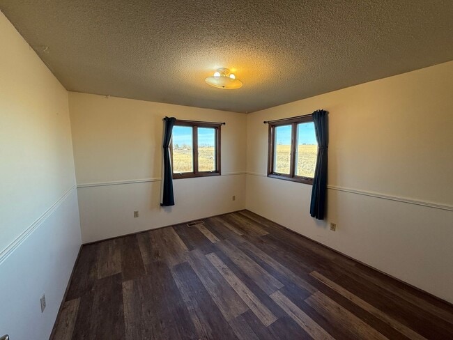 Building Photo - Spacious, four-bedroom, two-bathroom, country home, with two car attached garage, and more!