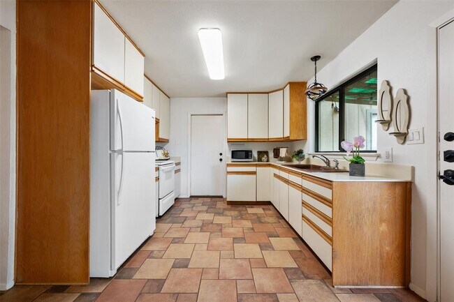 Building Photo - 9504 Quail Village Ln