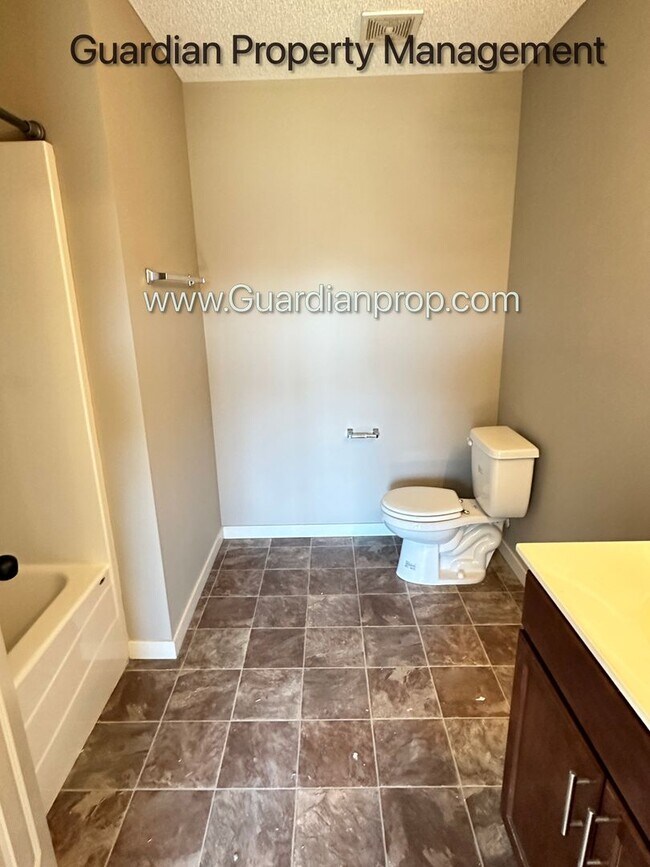 Building Photo - Champlin Corner Unit Town Home, 2 Car Garage, Dishwasher, Washer/Dryer, Balcony