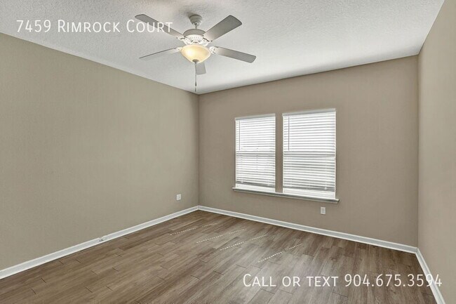 Building Photo - 7459 Rimrock Ct