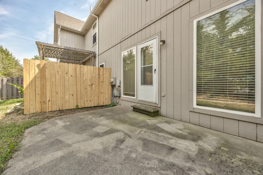 back patio with privacy divider - 22810 West 71st Terrace