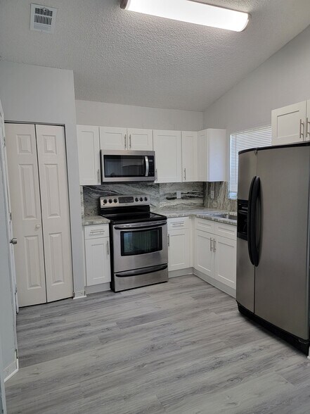 Fully Renovated Kitchen with New Cabinets, Granite Countertops, stainless steel Appliances - 3621 NW 193rd St
