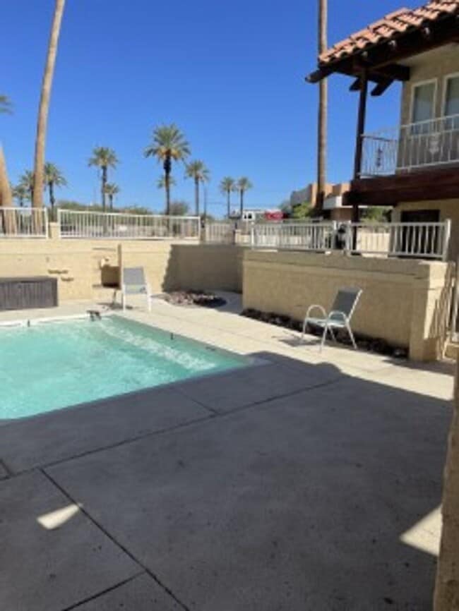 Building Photo - Spacious 3 bedroom, 3 bath, condo with a l...