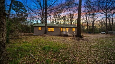 Building Photo - Rural, wooded living in this 4 bedroom, 2 full bath home on just under a quarter of an acre. NEW ...