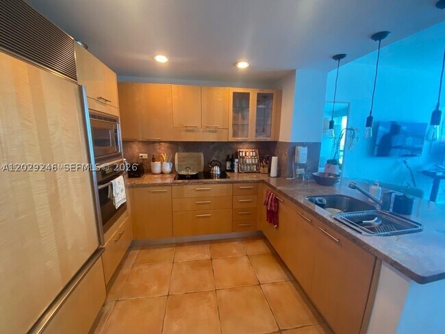 Building Photo - 6799 Collins Ave