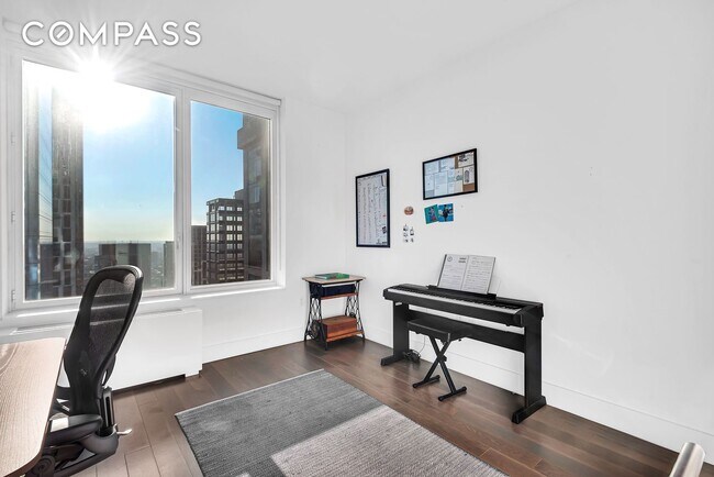 Building Photo - Elegant Condo Living with Impressive Views and Exclusive Building Amenities in the Heart of Downt...