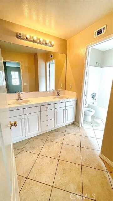 Building Photo - 17543 Nutwood Dr