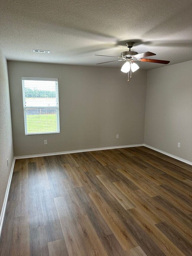Building Photo - Pre-Leasing Now! Discover Spacious Living in This 4-Bedroom, 2-Bath Cabot Home