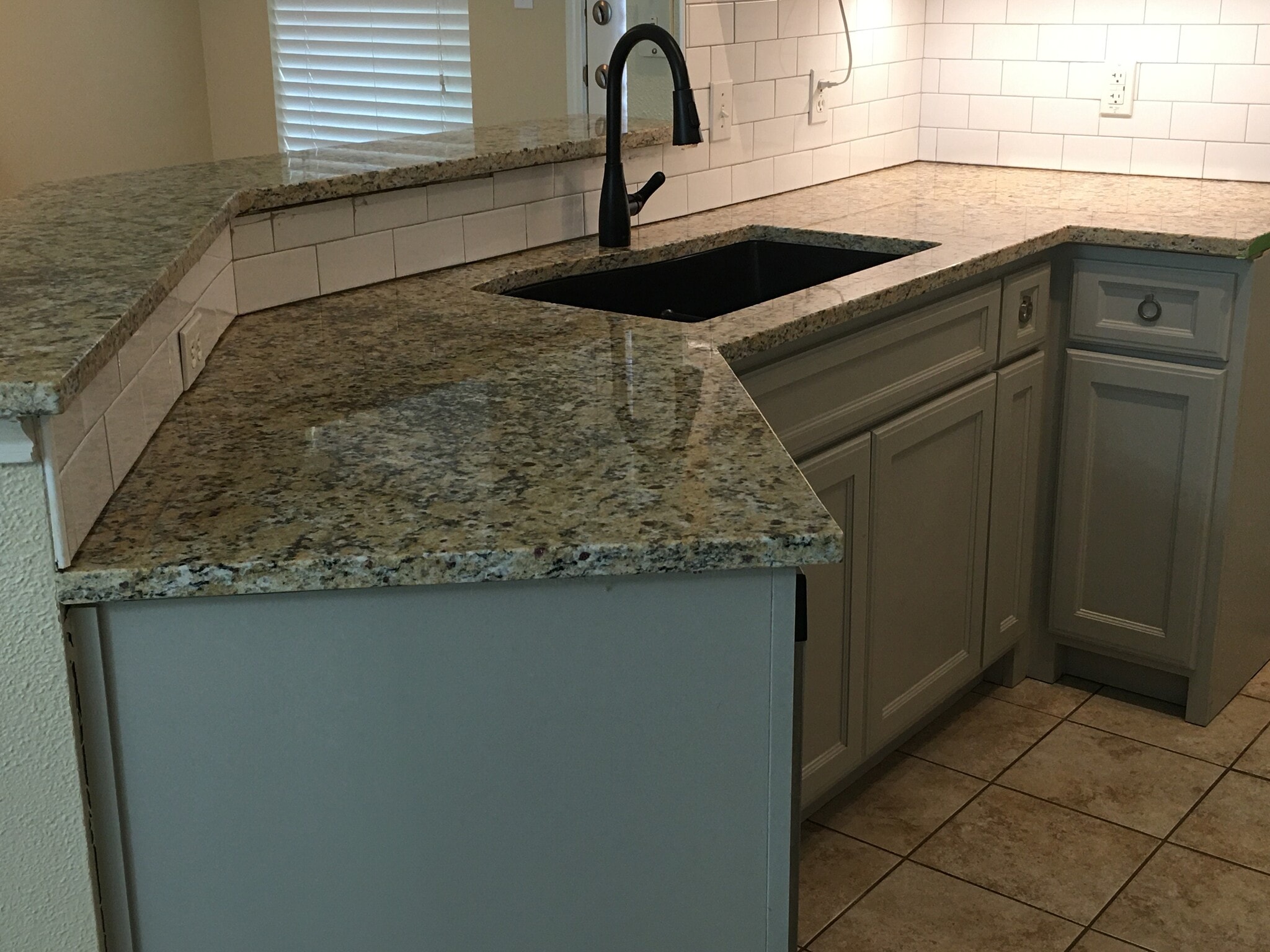 New granite countertop, sink, faucet (paint color is off) - 7556 Arbor Hill Dr
