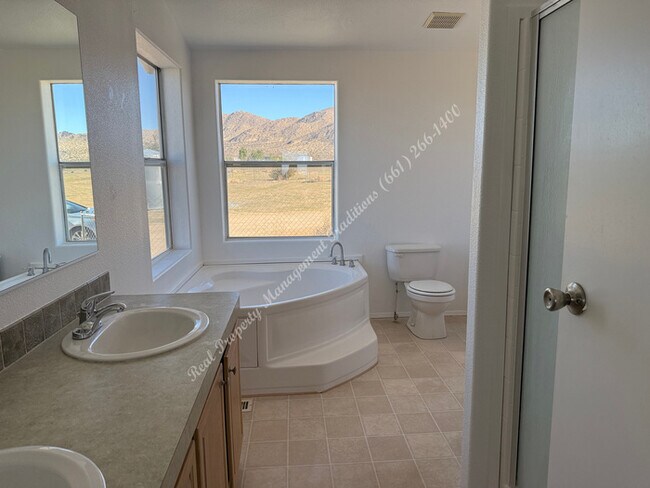 Building Photo - New Year Special! 50% Off First Month's Rent!