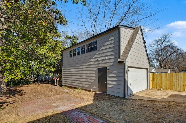 Building Photo - Charming Renovated Home Near U of M – Featuring Expansive Workshop & Garage
