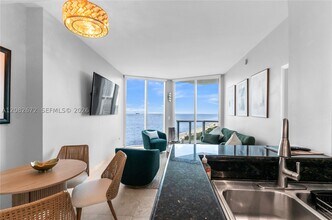 Building Photo - 6515 Collins 1504
