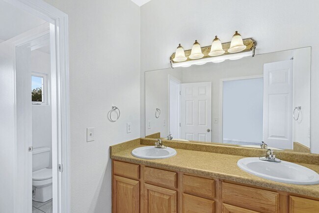 Building Photo - Townhome near Fort Carson with 2 Suites an...