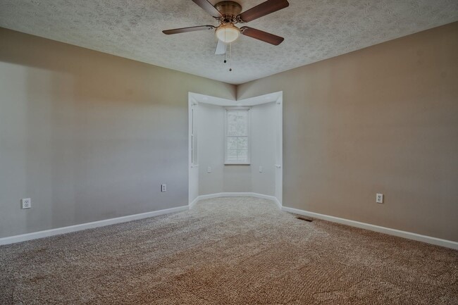 Building Photo - SHORT TERM - Spacious 3-Bedroom home with Wrap-Around Porch