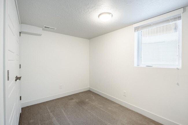 Building Photo - Updated and Bright Home with Yard