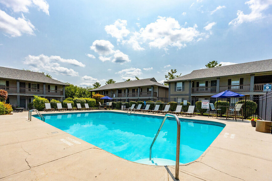 Refreshing Swimming Pool and Lounge Area at The Commons Student Apartments in Oxford, OH - The Commons