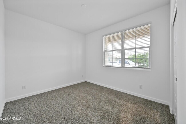 Building Photo - 38180 W Amalfi Ave