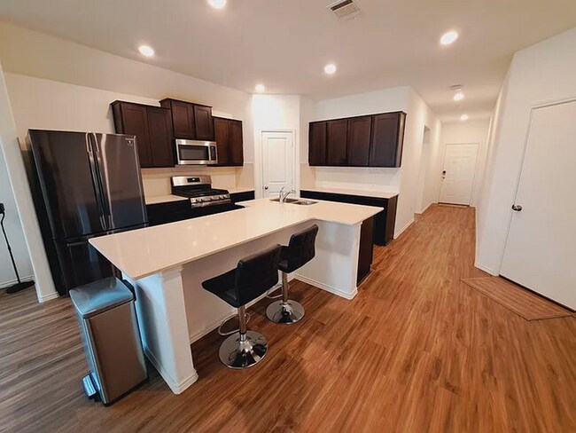 Building Photo - COMING SOON! Beautiful 4BR 3BA w/ Fenced Backyard • Private Yard• Attached Garage in Siena