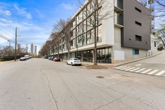Building Photo - Awesome 1BR Loft Style Condo Overlooking Midtown!