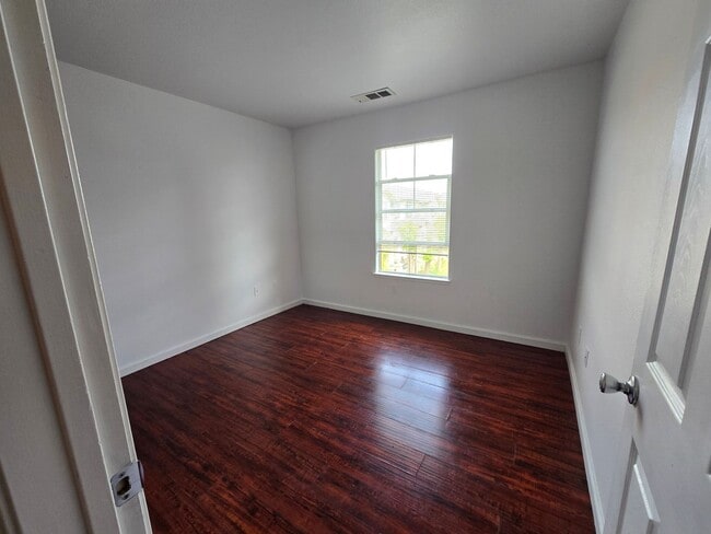 Building Photo - Beautifully Remodeled Tri Story Home located in a Gated Community ...