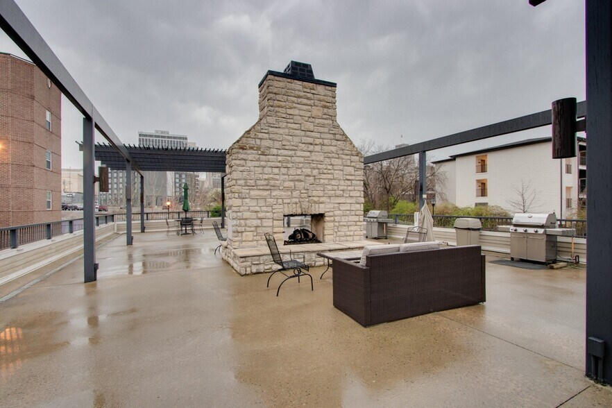 Common/community space with grills and fireplace - 301 Criddle St