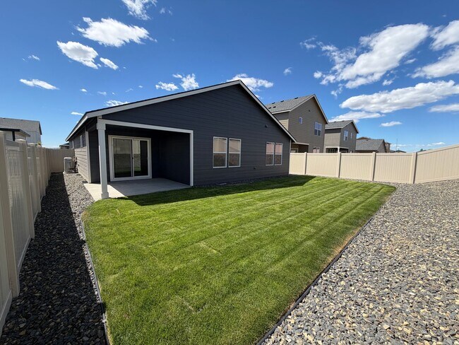 Building Photo - Beautiful & Brand New- 4 bed, 2 bath w/Quartz Countertops & Fenced Yard