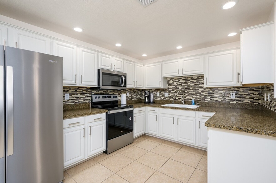 Building Photo - 9455 E Raintree Dr