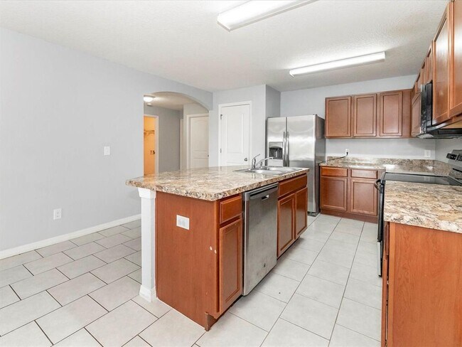 Building Photo - 5555 Maggiore Blvd