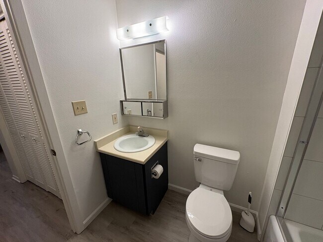 Building Photo - Updated **2 Bedroom | 1.5 Bath | 1-Car Garage Townhome**