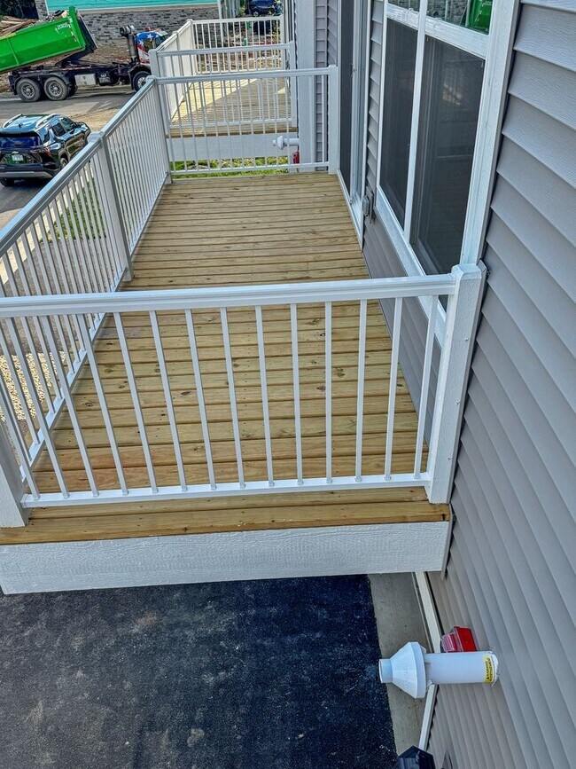 Building Photo - Step into modern living with this brand-ne...