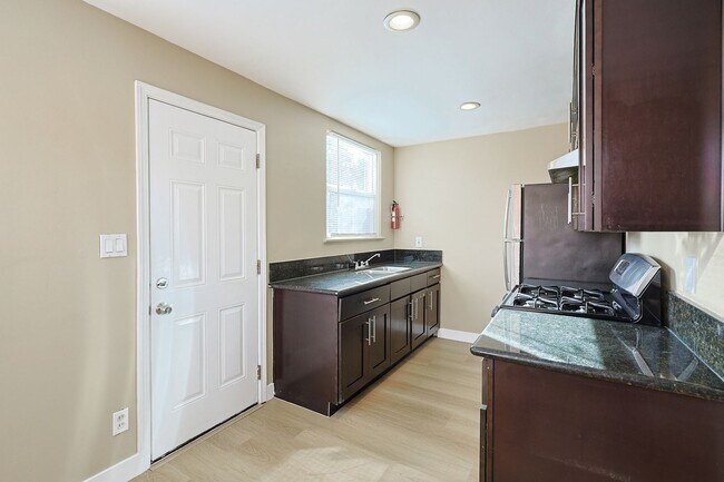 Building Photo - 5461-65 Imperial Ave