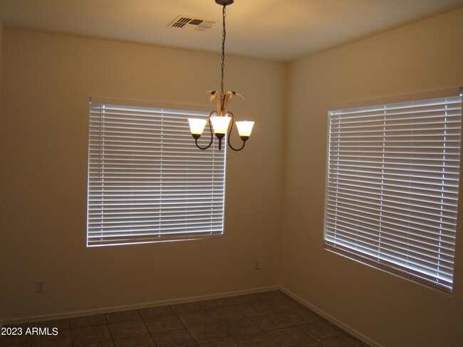 Building Photo - 9238 W Milkweed Loop