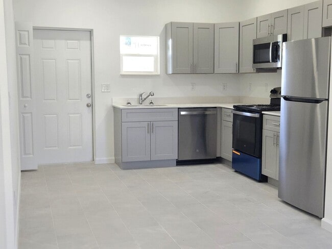 Building Photo - Brand New 2/2/1-PRIME SW LOCATION - Lehigh Acres