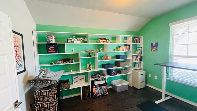 Office with build-in bookshelf - 7108 Garnet Mill Ln