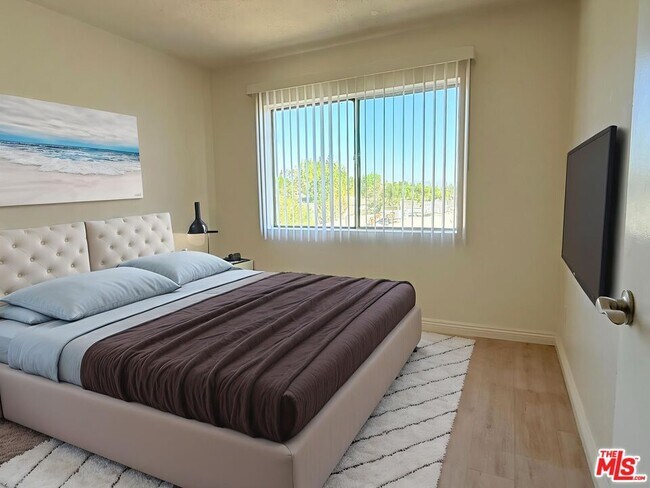 Building Photo - 10200 De Soto Ave