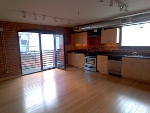 Building Photo - Downtown Loft-Style Studio Condo | 720 Sq....