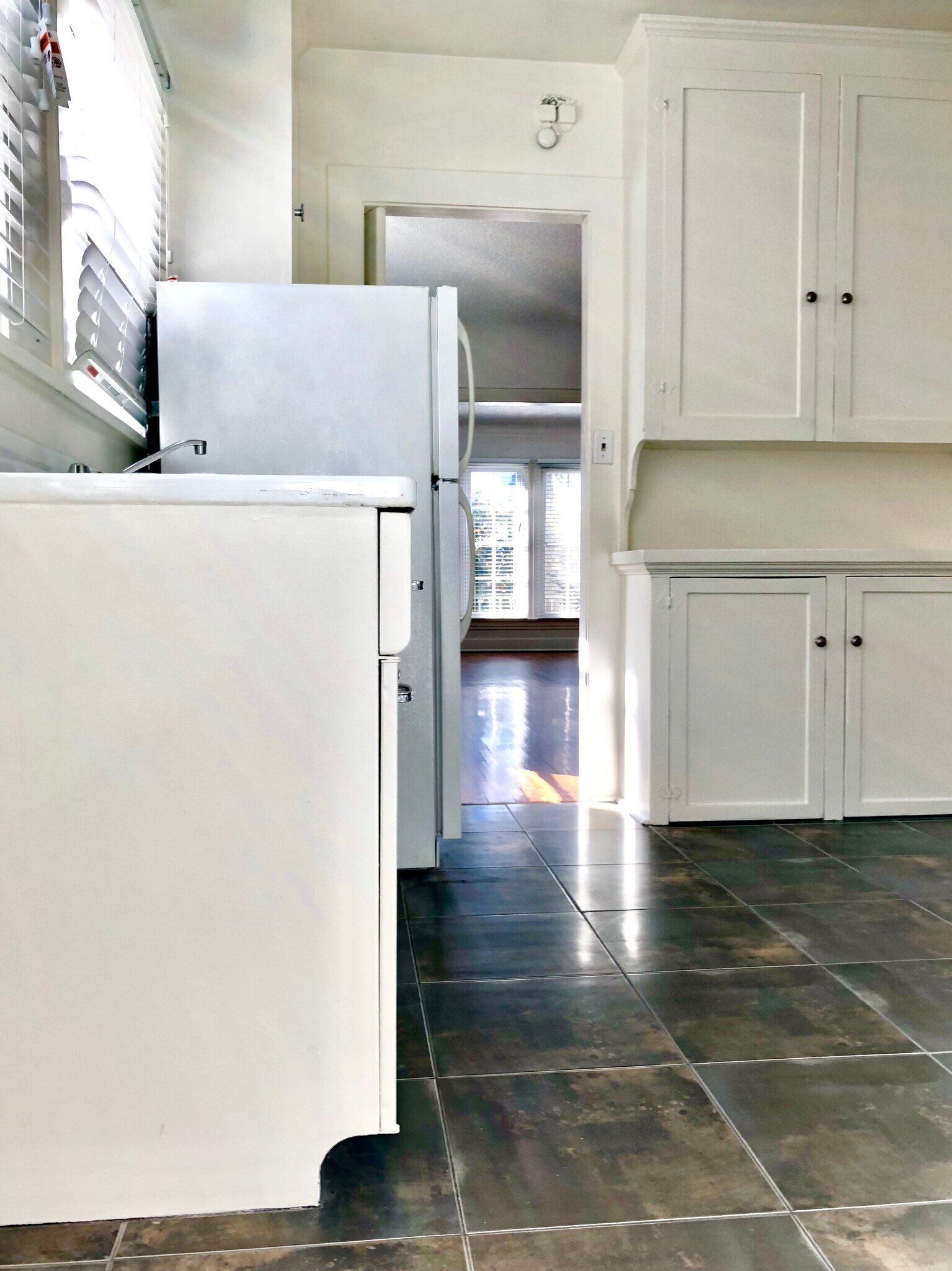 Kitchen tile floors - 1134 N Gardner St
