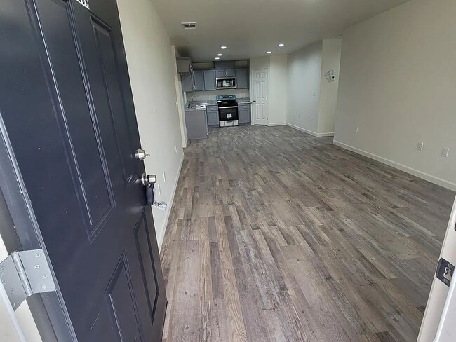 Building Photo - Freshly painted home, LVP flooring, close to schools, park, and shopping. Quiet neighborhood near...